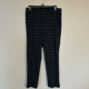 Women’s dressy pull on pants, size medium and they are black and green.